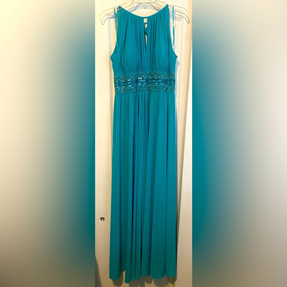 Beautiful and fun teal gown